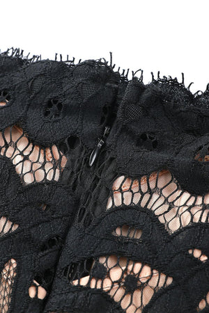 a close up of a black lace dress