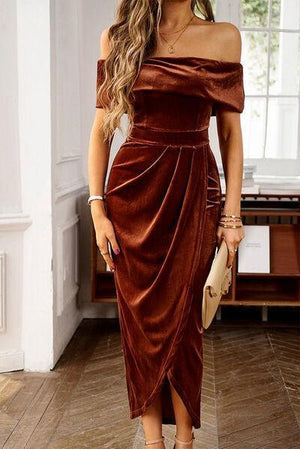 a woman wearing a brown velvet dress