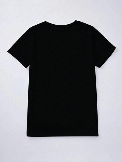 a black t - shirt hanging on a white wall