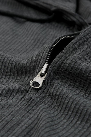 a close up of a zipper on a sweater