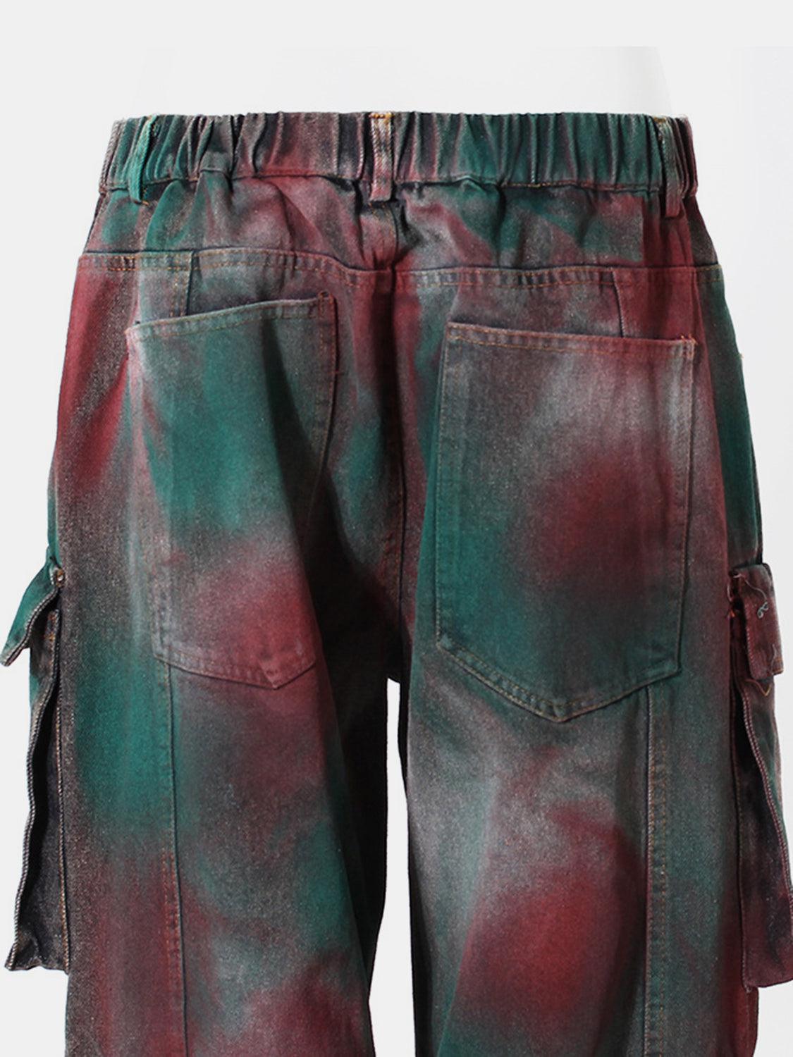 a pair of green and red pants with a tie dye pattern