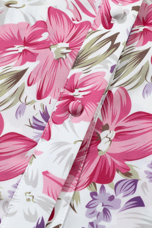 a close up of a pink and purple flowered shirt