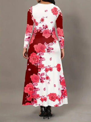 a woman in a long dress with flowers on it