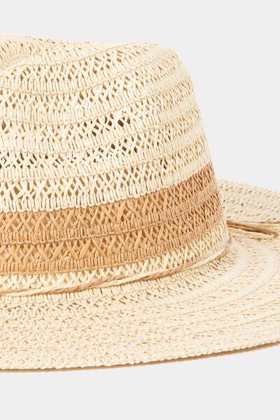 a straw hat with a brown band on a white background