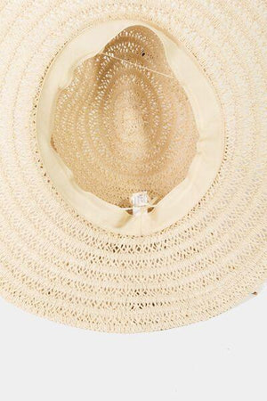 a straw hat with a white ribbon around the brim
