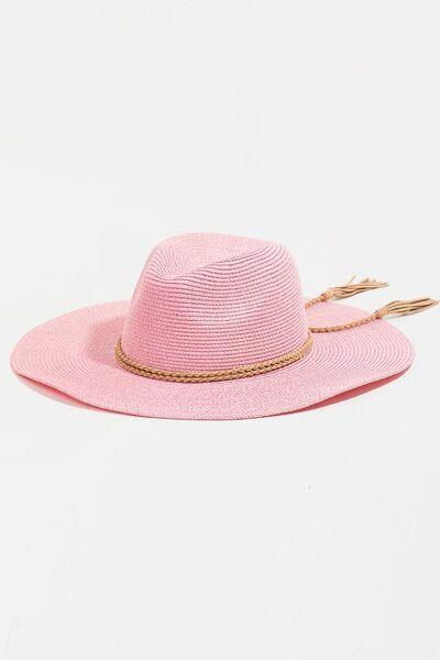 a pink hat on a white background
