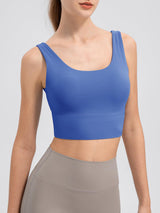 a woman wearing a blue crop top