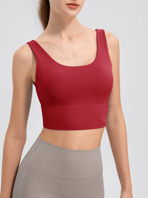 a woman wearing a red crop top