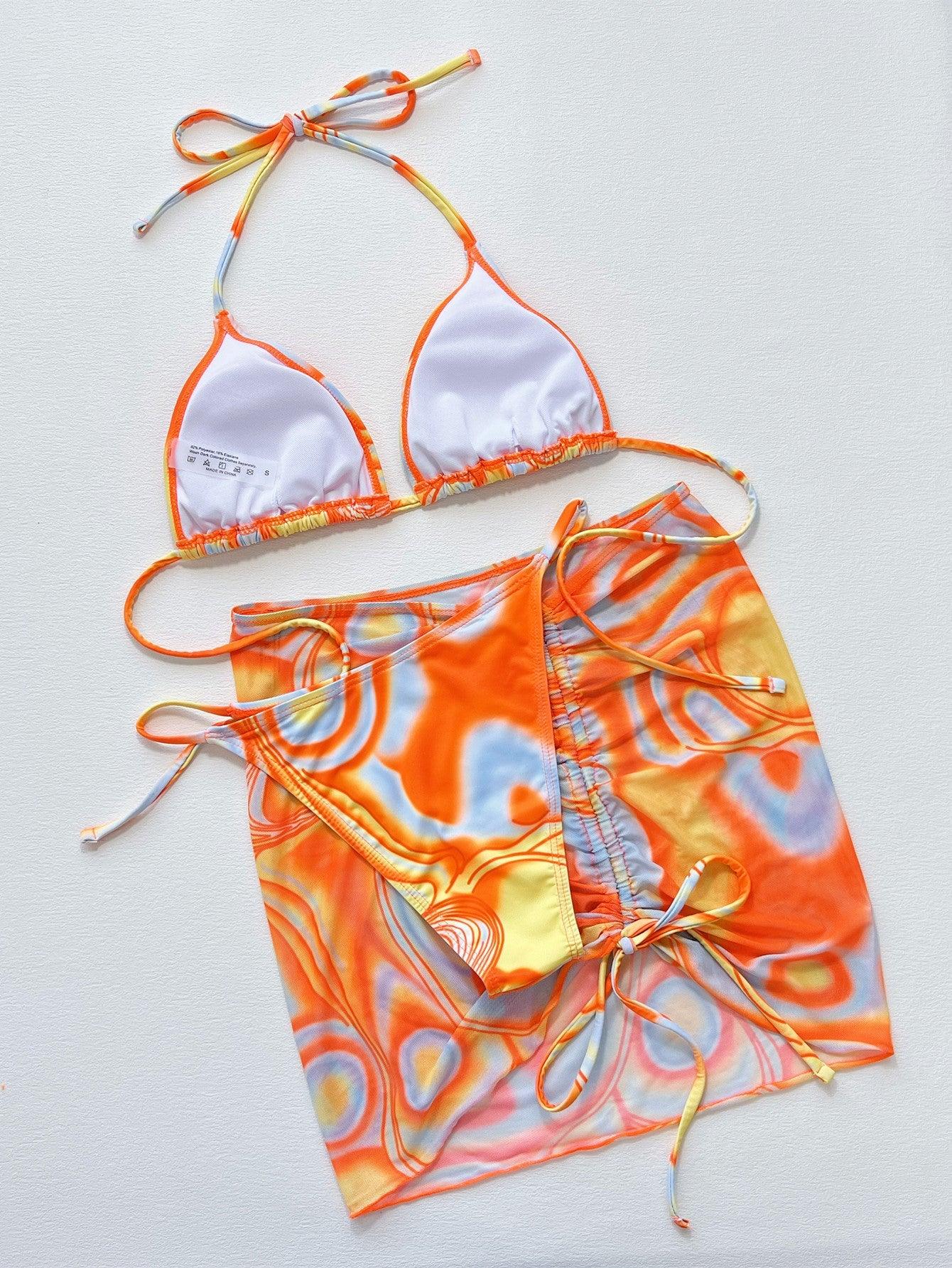 two pieces of swimwear on a white surface