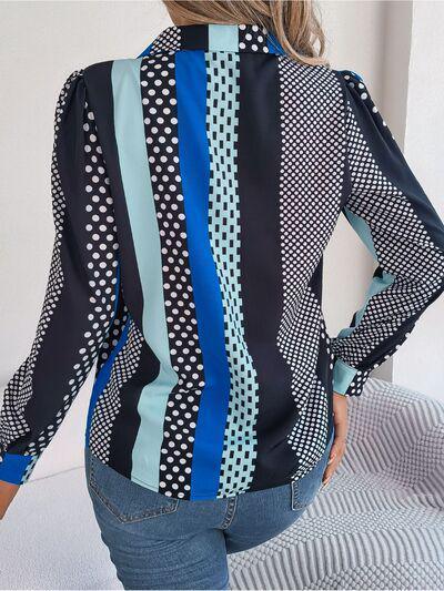 a woman wearing a polka dot shirt and jeans