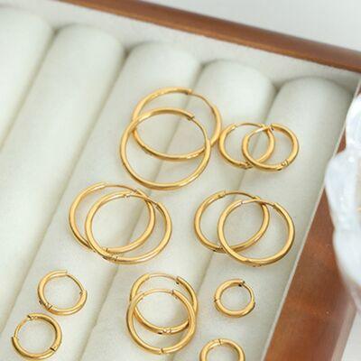 a bunch of gold rings sitting in a box