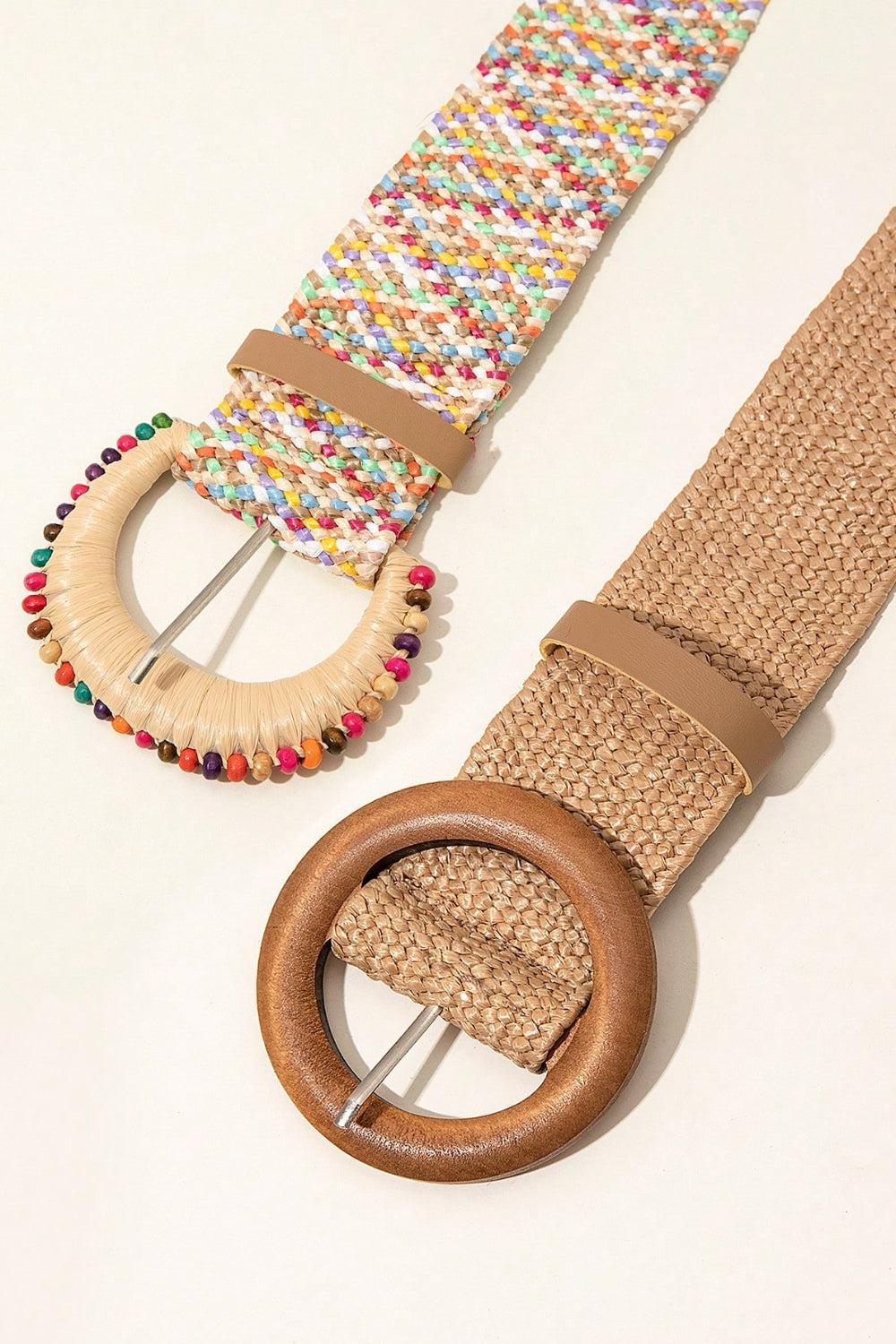 a belt with a wooden ring and a beaded belt