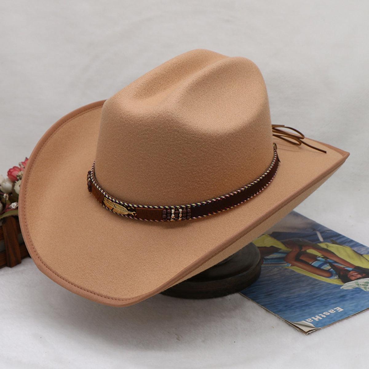 a brown hat sitting on top of a table