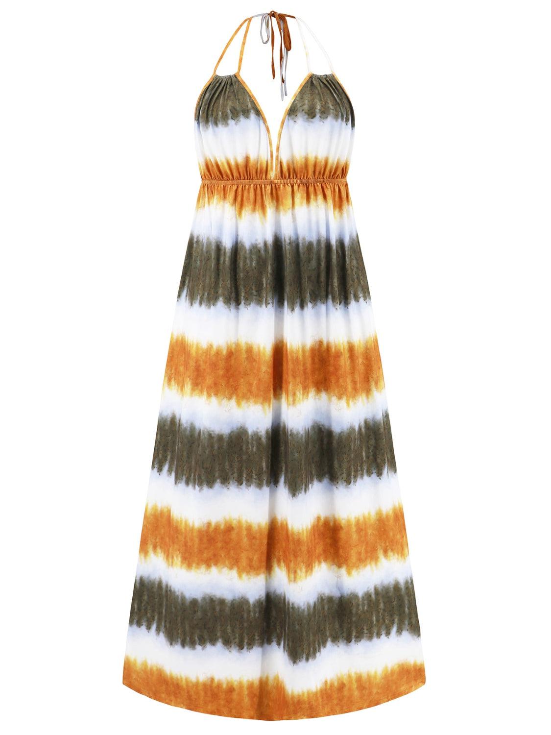 a dress with a halter neckline and a tie dye pattern