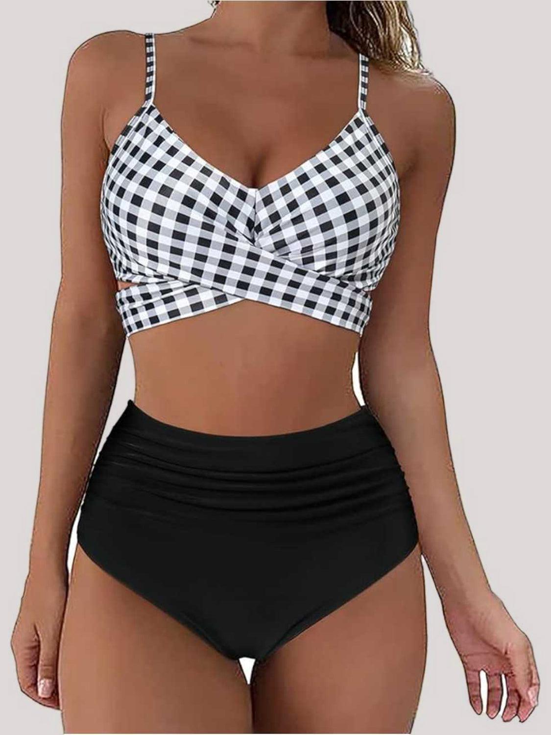 a woman wearing a black and white checkered bikini top