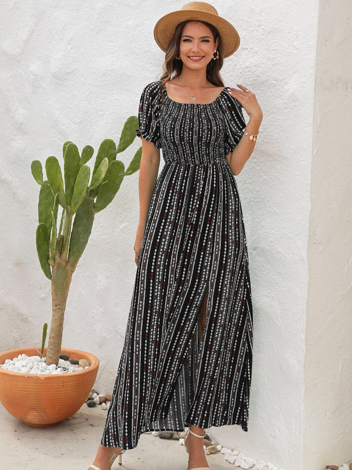 a woman standing next to a cactus wearing a hat