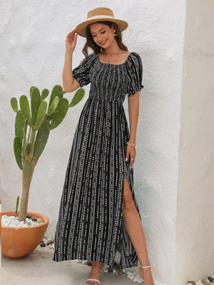 a woman in a dress and hat standing next to a cactus