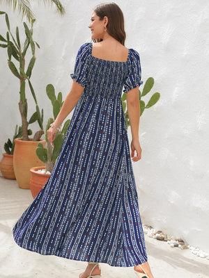 a woman in a blue and white striped dress