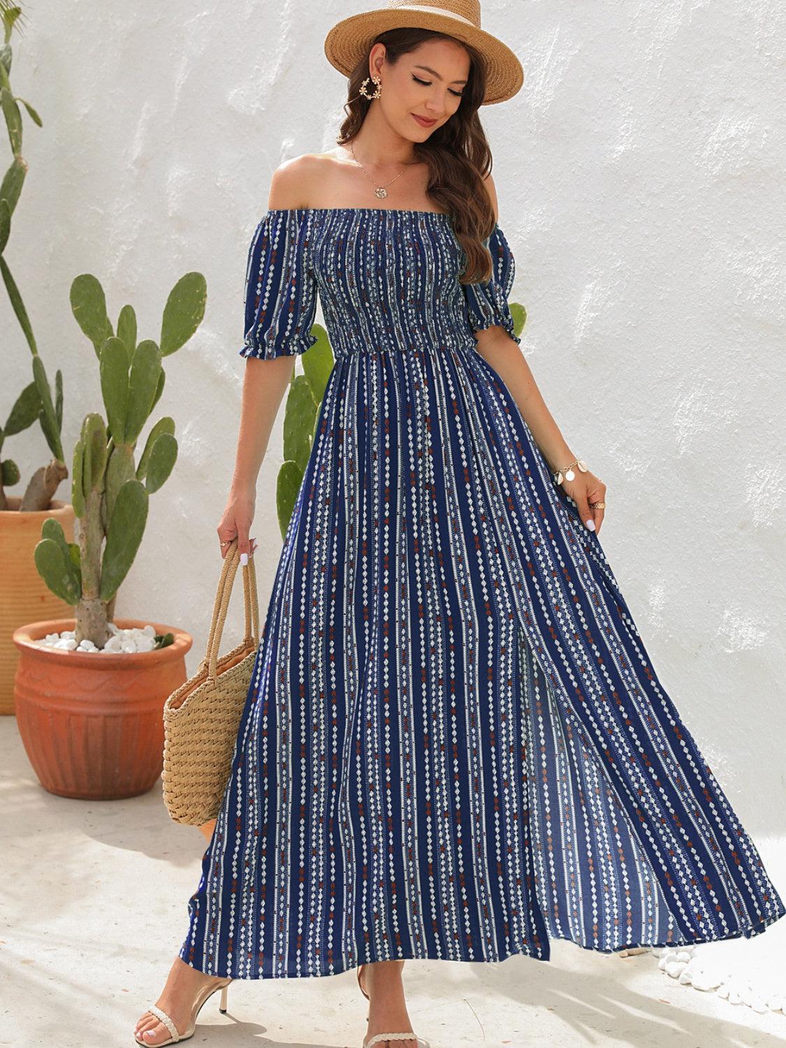 a woman wearing a blue and white striped dress