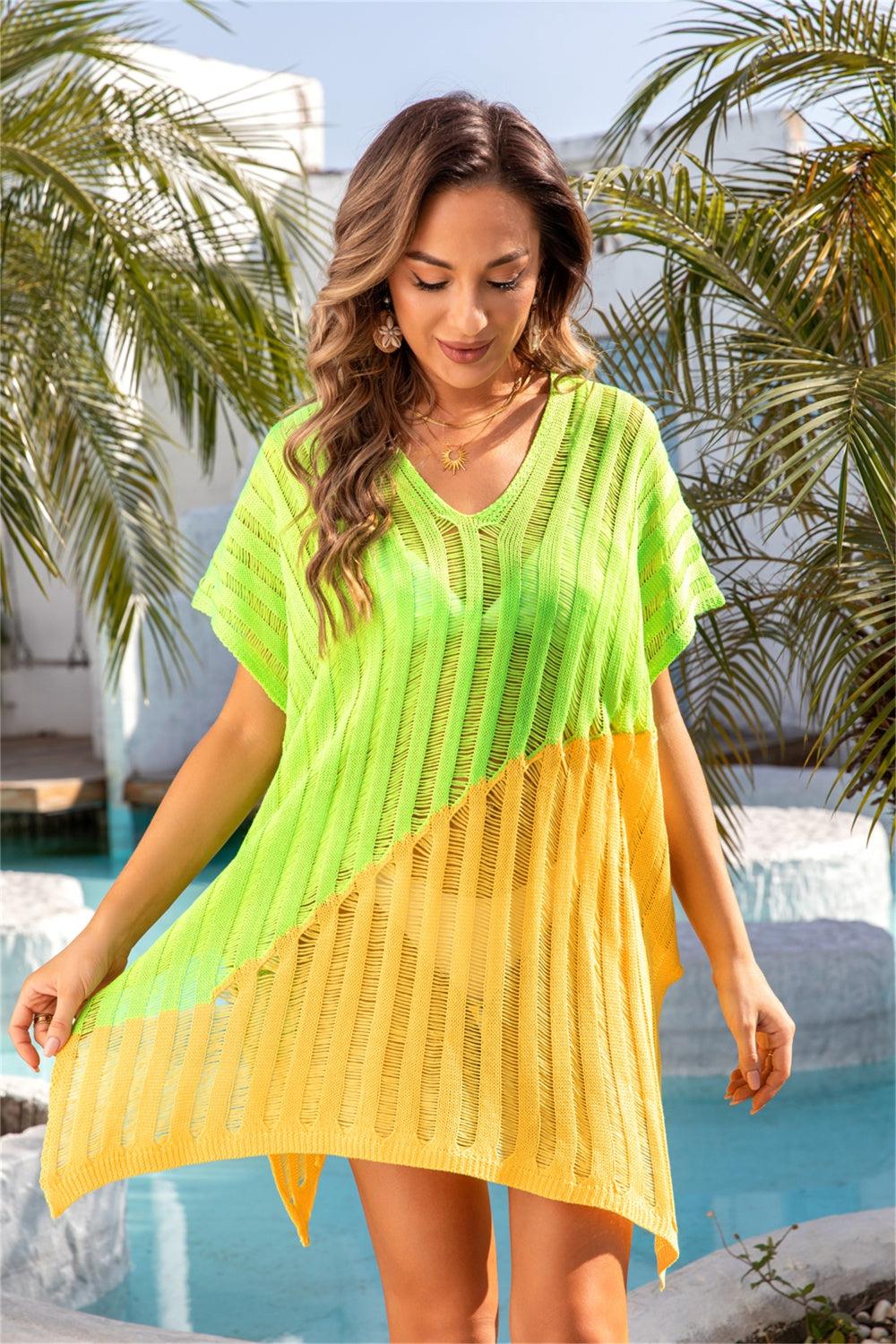 a woman standing next to a pool wearing a green and yellow dress