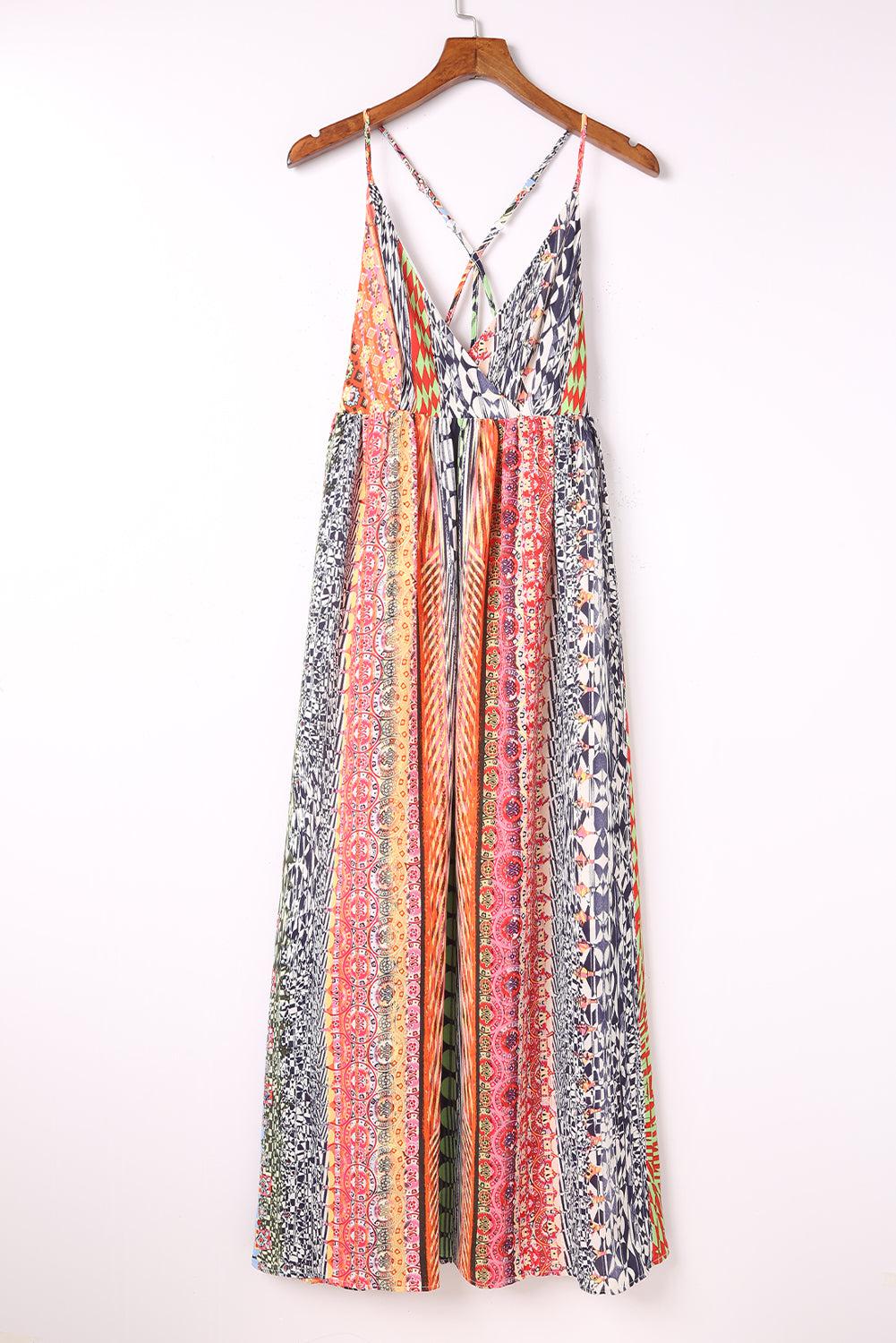 a dress hanging on a wooden hanger