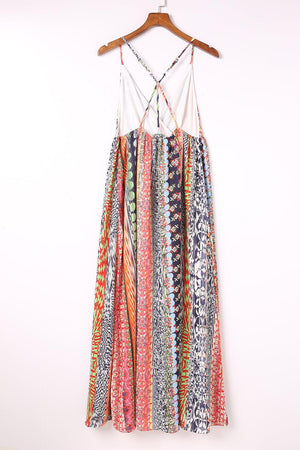 a multicolored dress hanging on a hanger