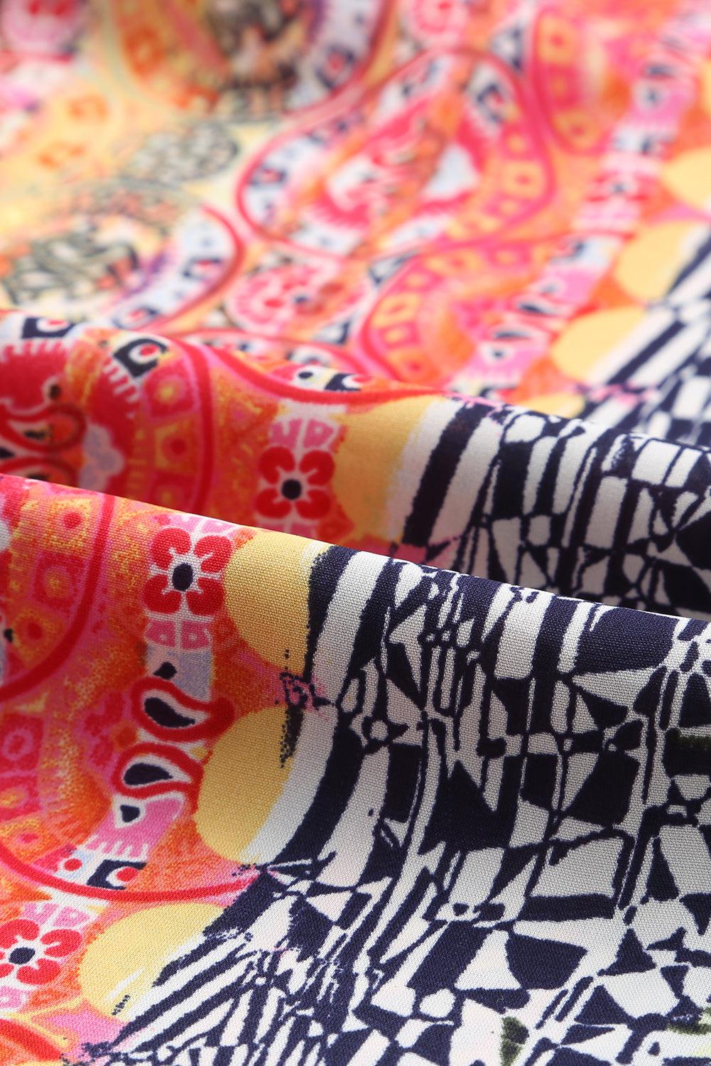 a close up of a colorful cloth with a design on it