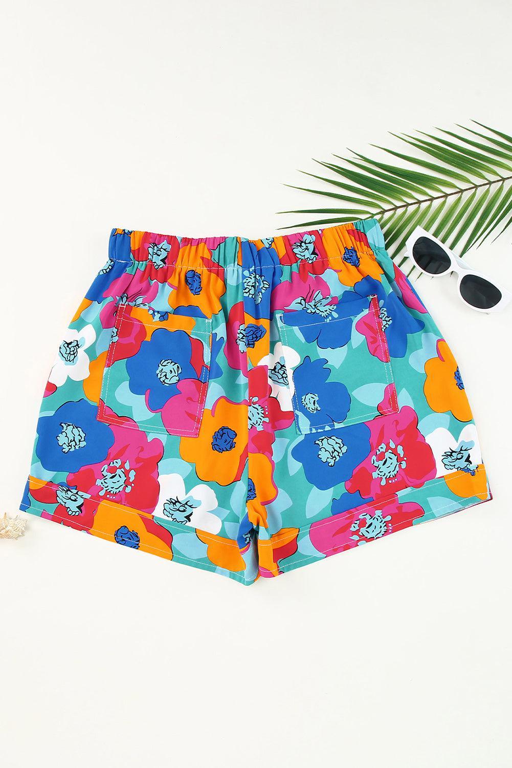 a pair of sunglasses and a pair of colorful shorts