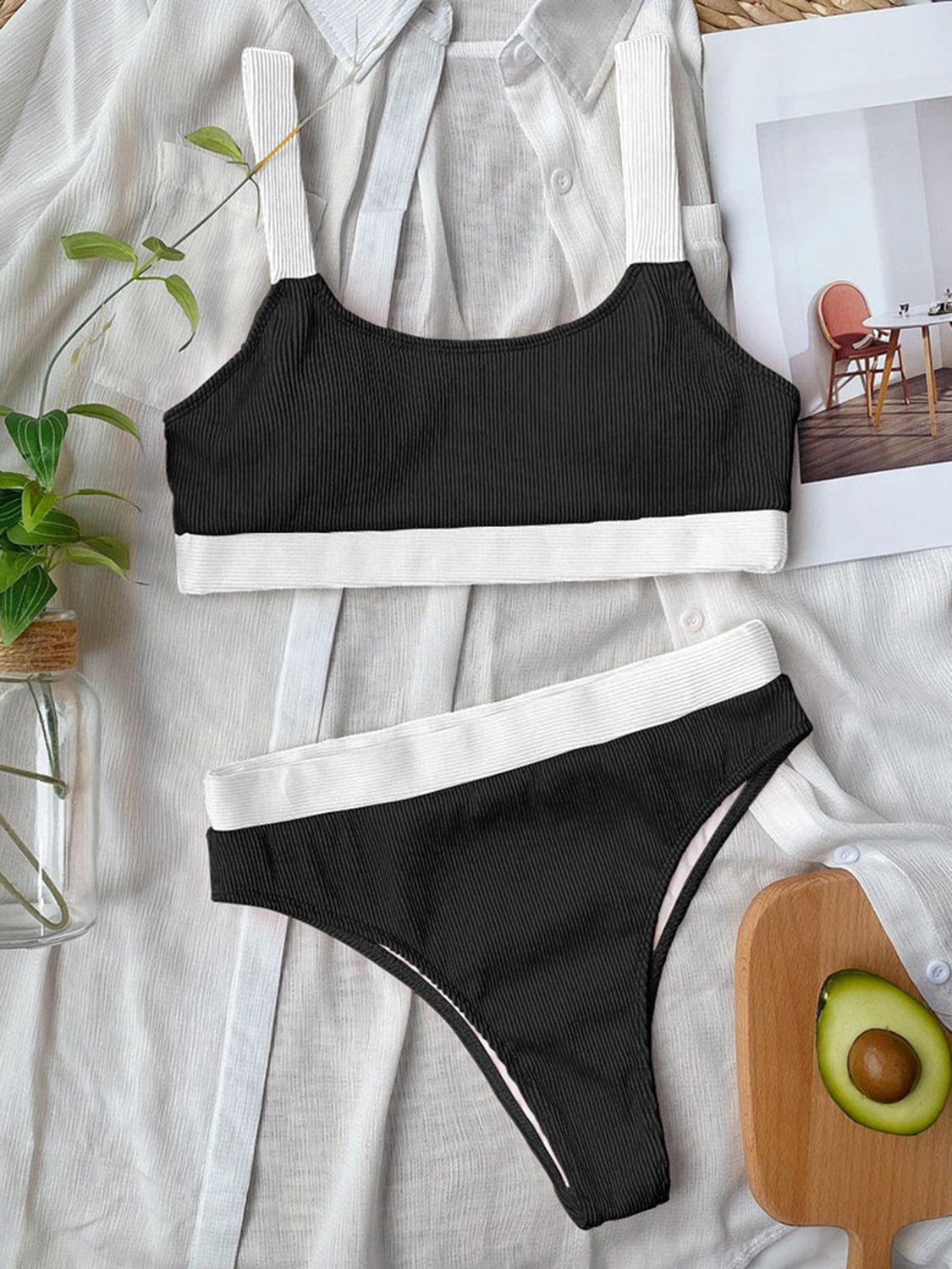 a woman's black and white bikinisuit and an avocado