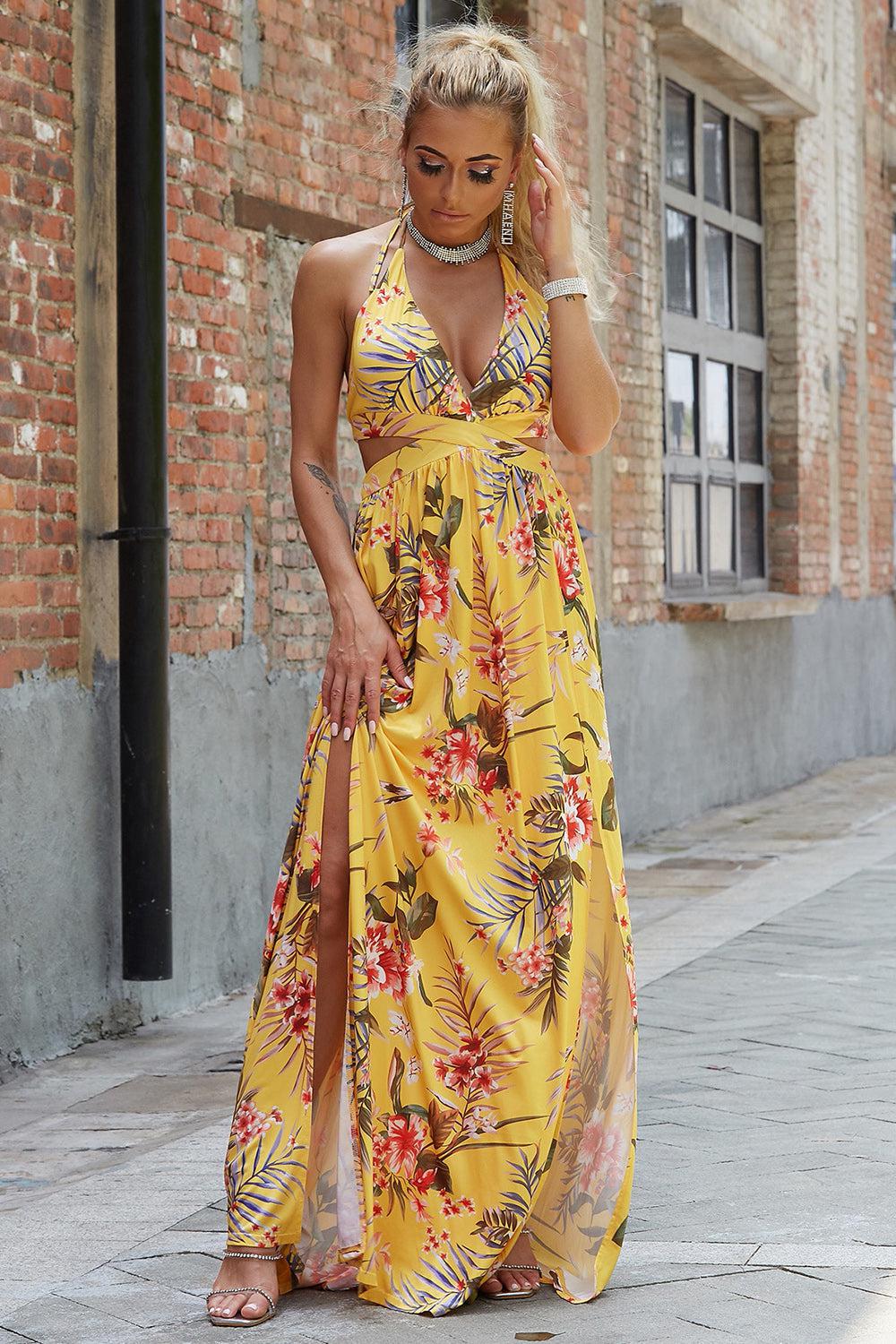 a woman in a yellow dress is walking down the street