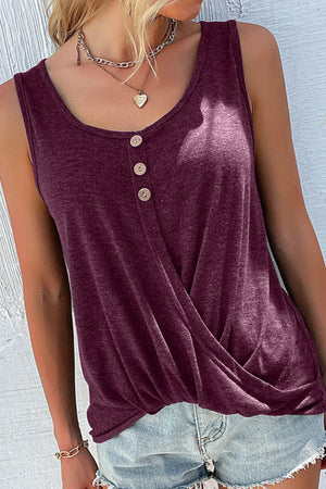 a woman wearing a tank top with a button down front