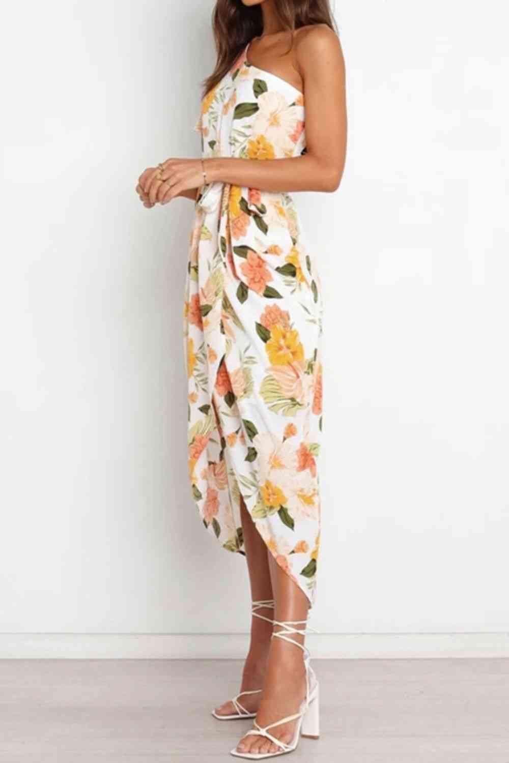 a woman wearing a floral print dress