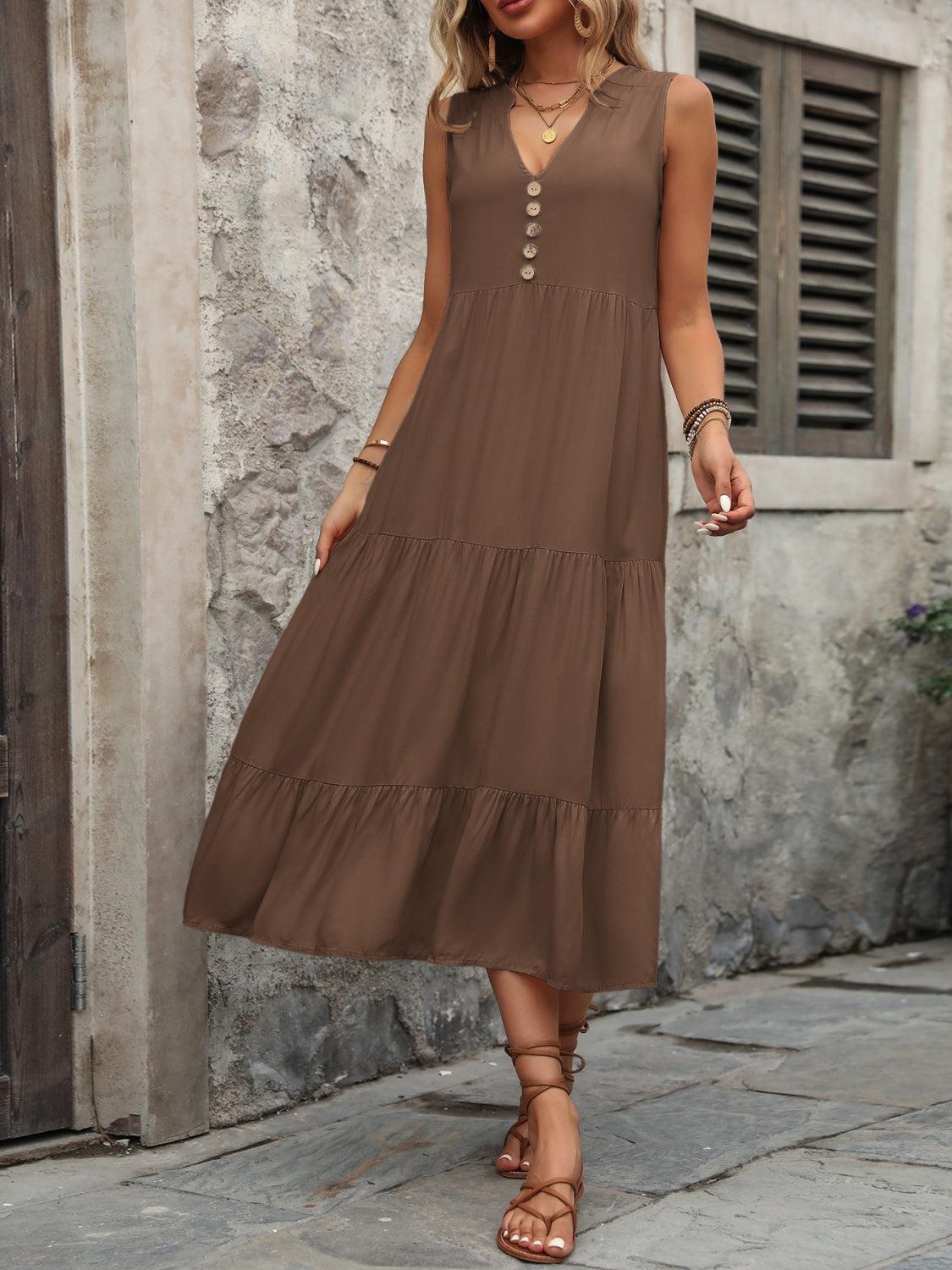 a woman wearing a brown dress and sandals