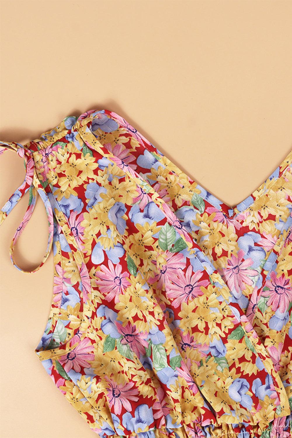 a yellow and blue floral print dress on a tan background