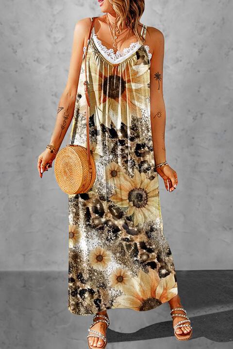 a woman in a sunflower print dress