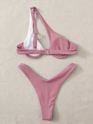 a pink and white bikini top and bottom