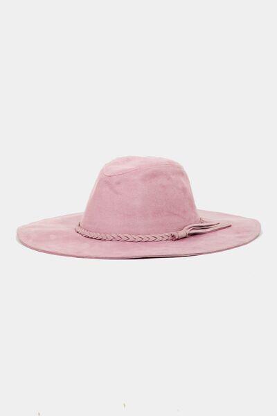 a pink hat on a white background