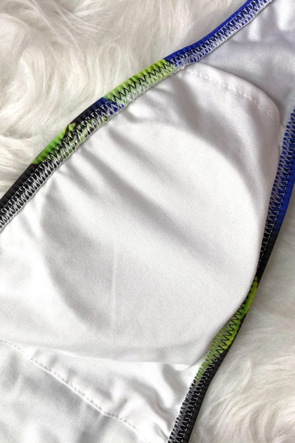 a close up of a white shirt with a zipper