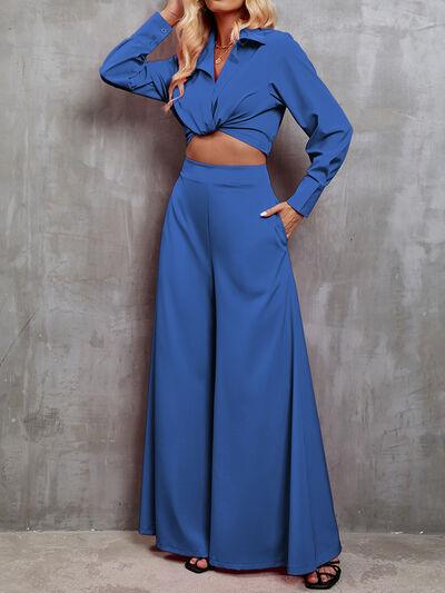 a woman in a blue outfit posing for a picture