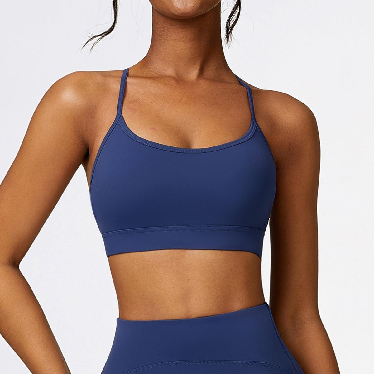 a woman in a blue sports bra top