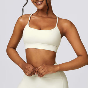 a woman in a white sports bra top