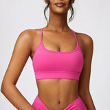 a woman in a bright pink bikini top