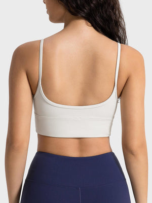 a woman wearing a white sports bra top