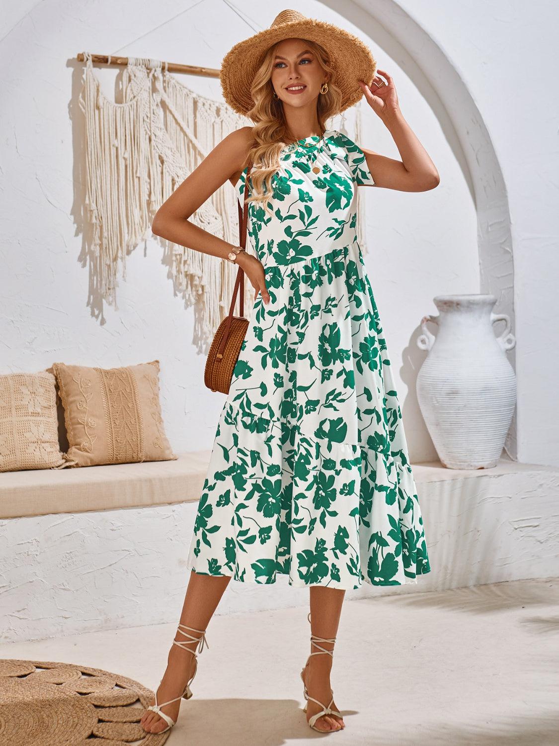 a woman in a green and white dress and hat