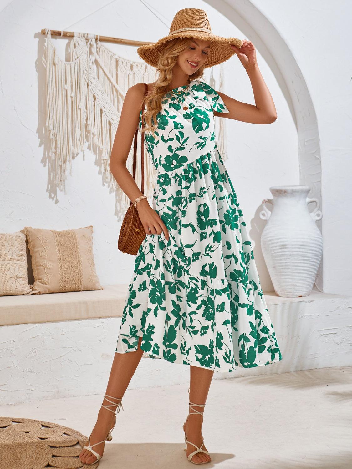 a woman in a green and white dress and hat