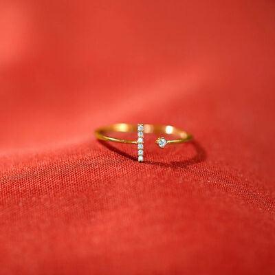 a close up of a ring on a red cloth