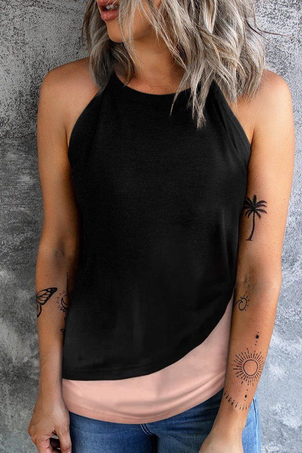 a woman wearing a black top with a palm tree tattoo on her arm