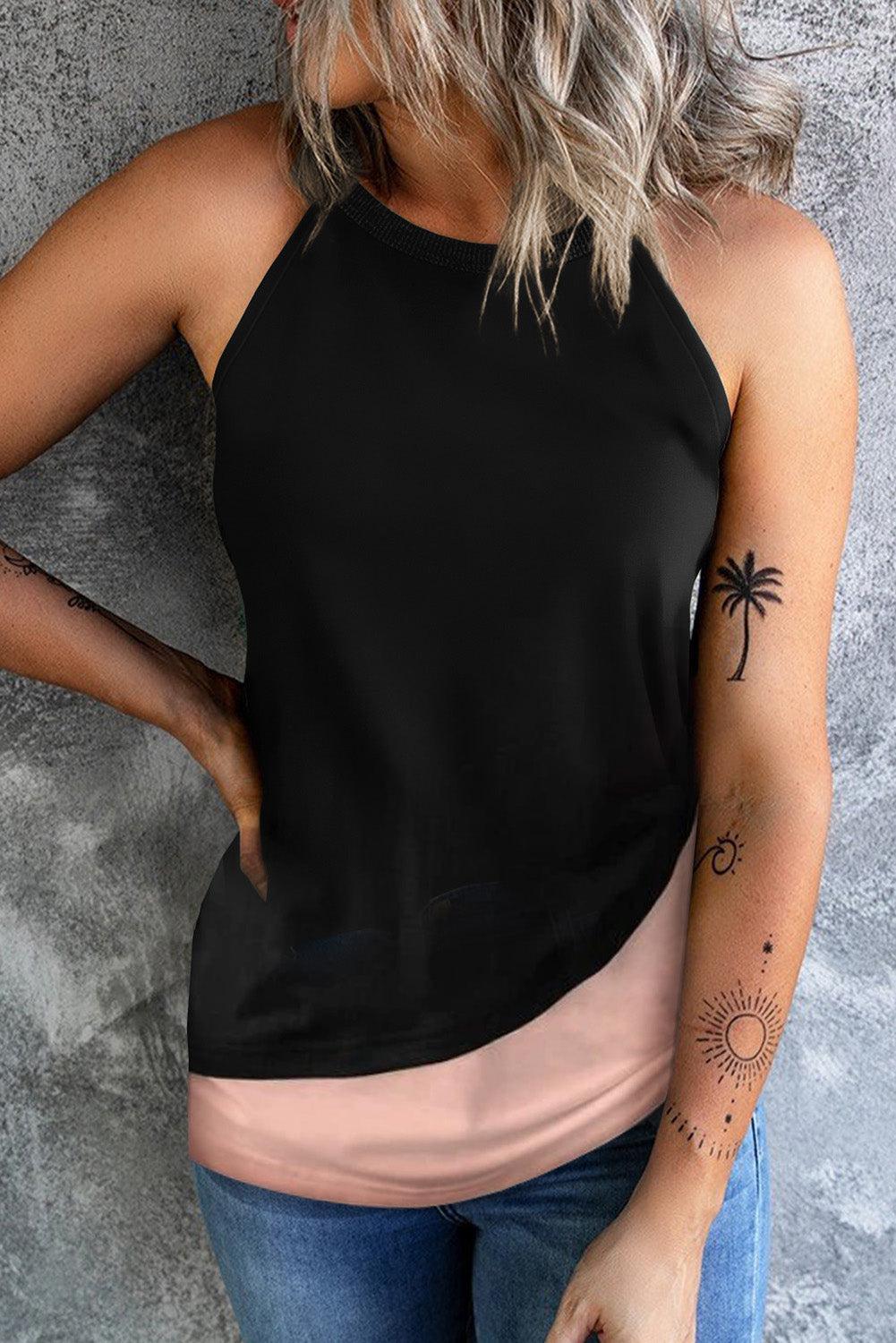 a woman wearing a black top with a palm tree tattoo on her arm