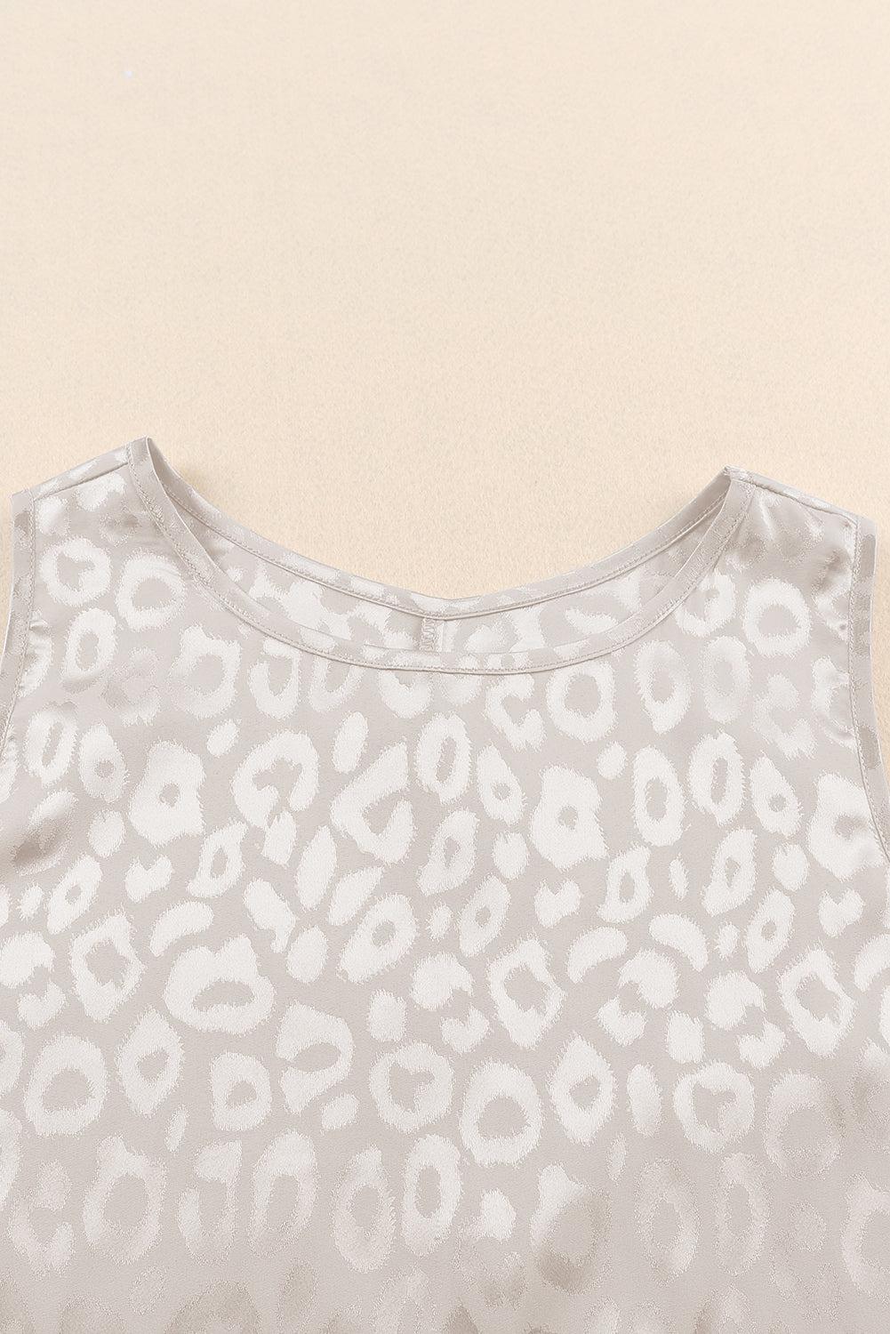 a white top with a leopard print on it