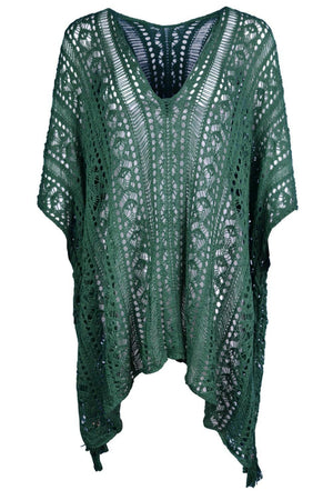 a green knitted top with a v neck
